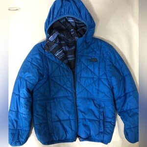 The North face. Puffer jacket. Boys. Used. Good condition.